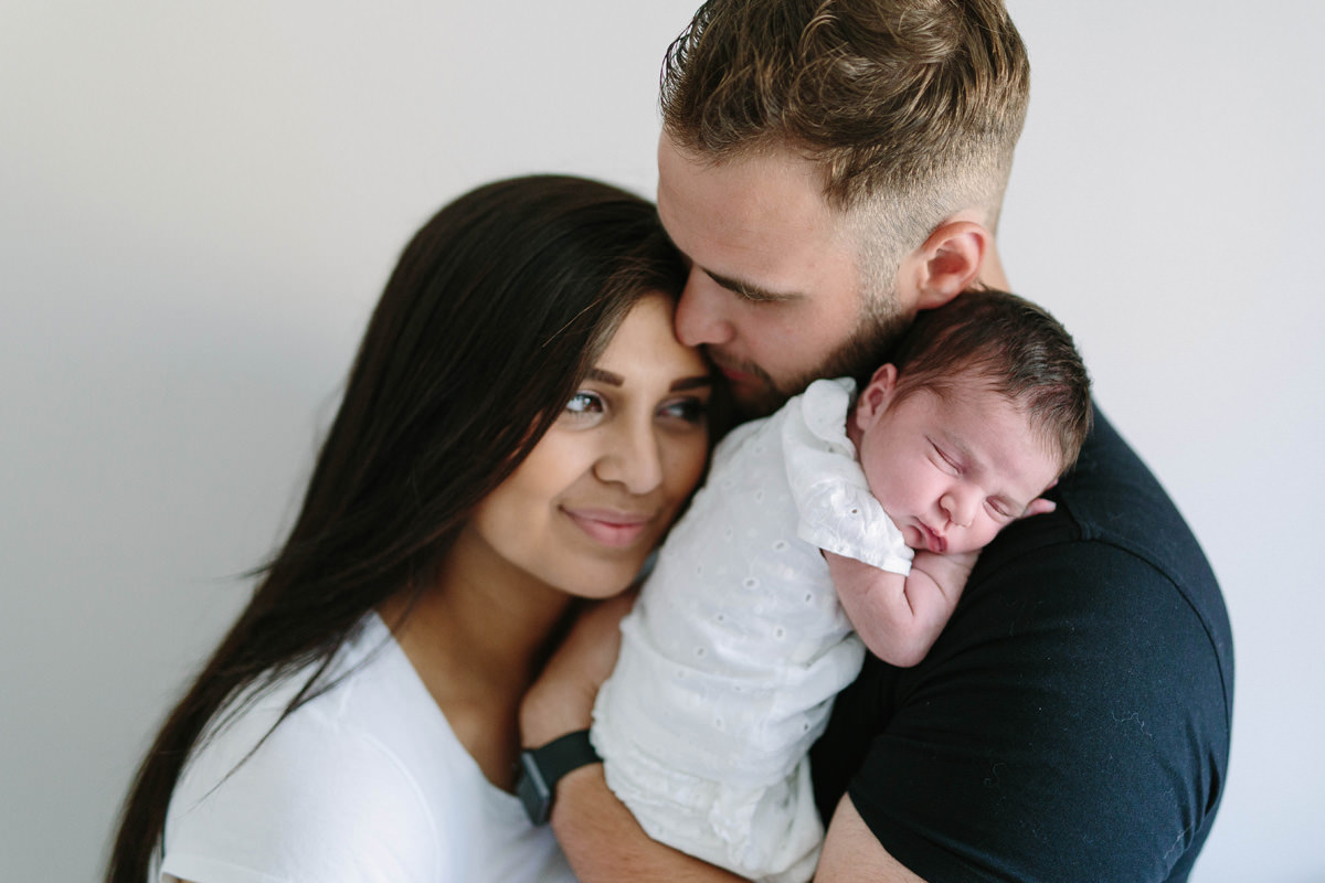 family family snuggle on the bed lifestyle photography yasmin anne