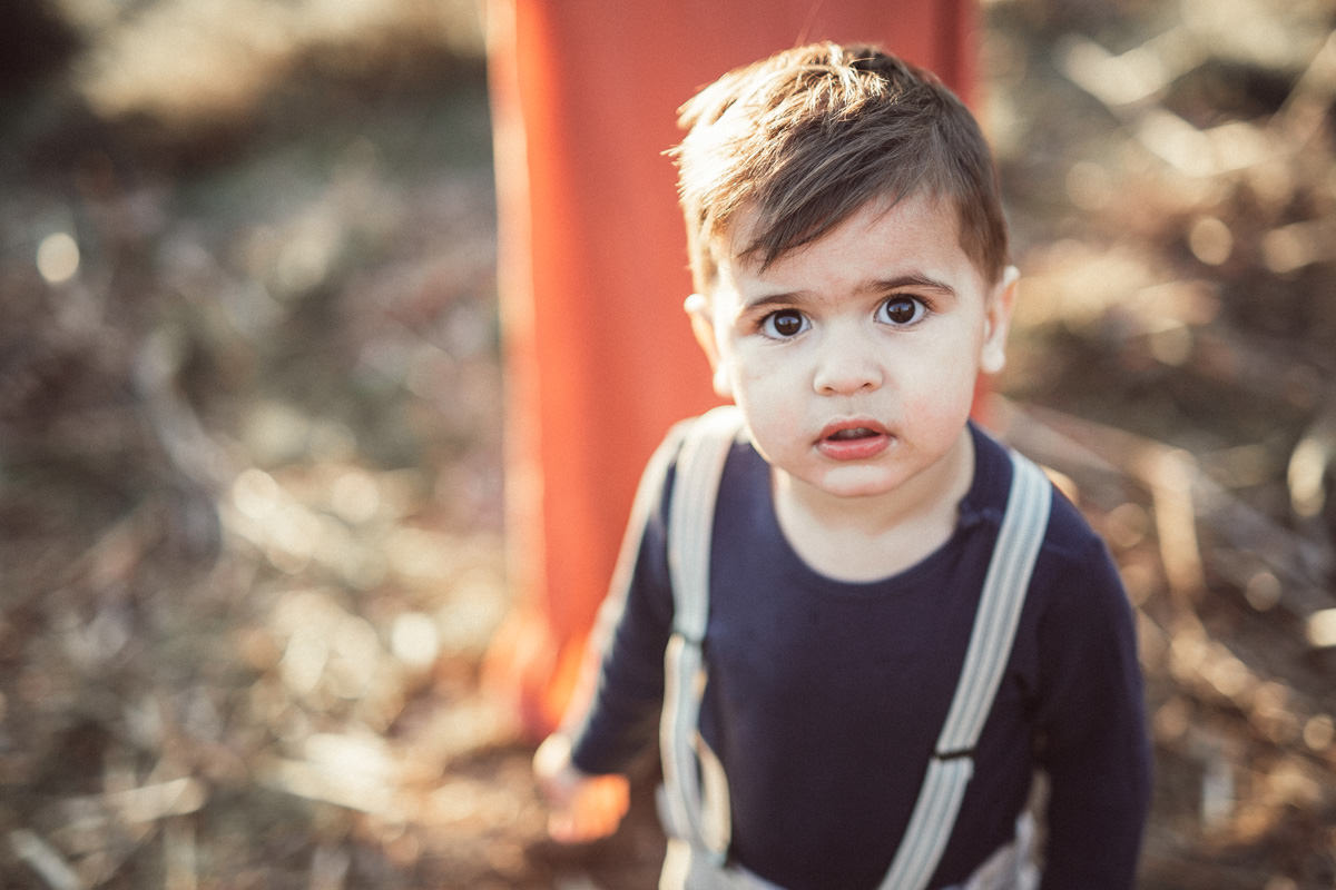 sunset toddler sibling close up