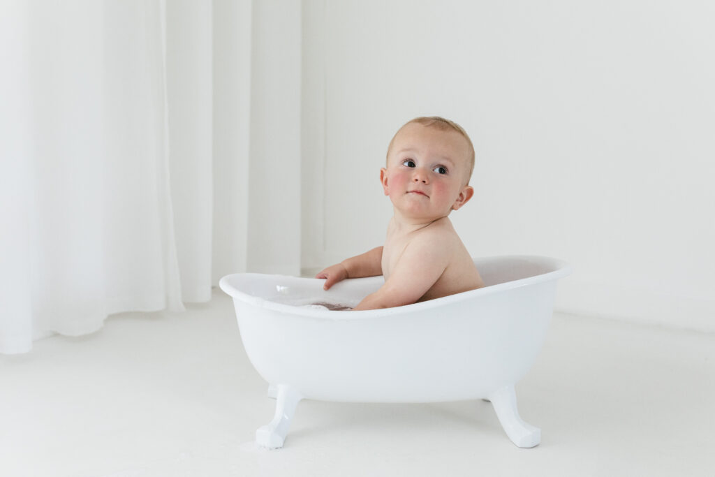 Baby in bath splash photoshoot