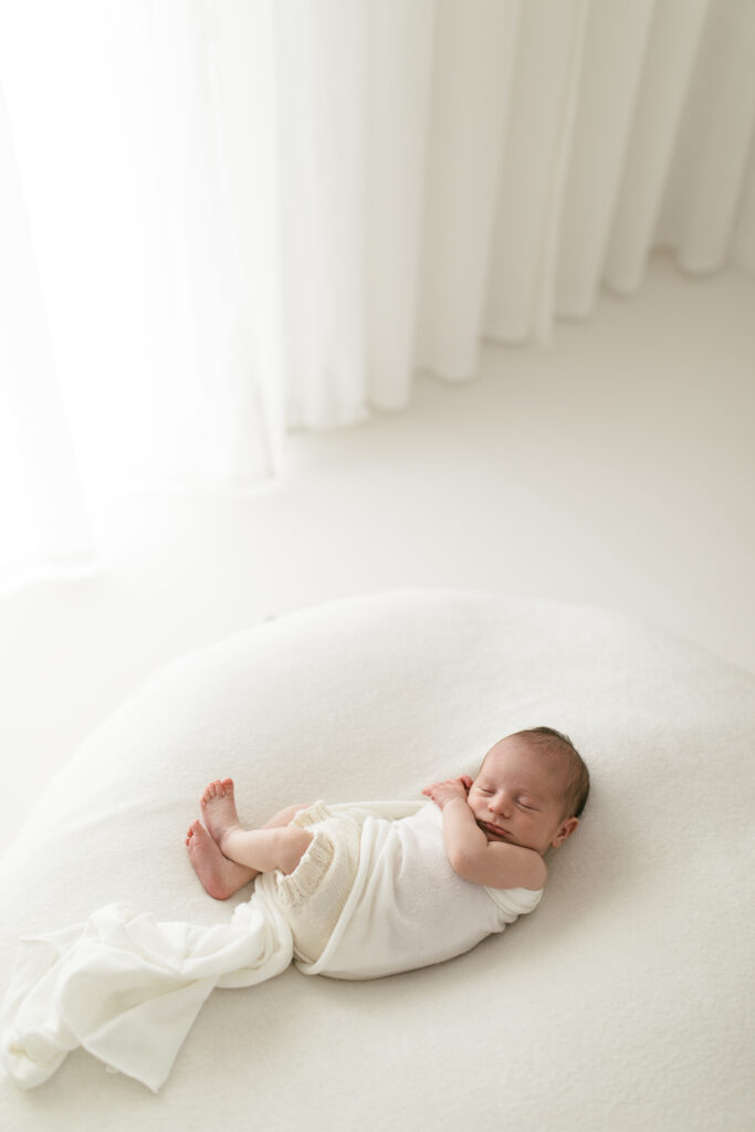 Baby sleeping on the bed Hampshire 