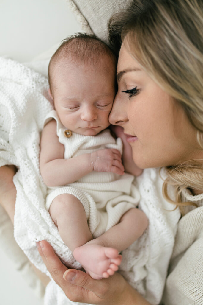 Cuddle together newborn photo