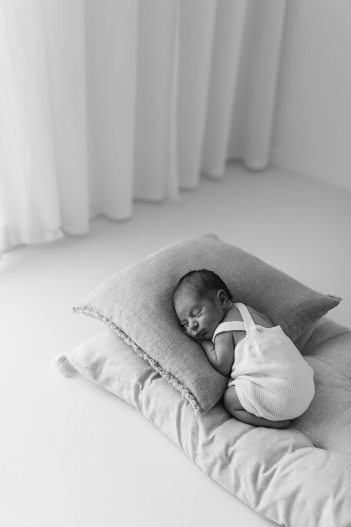 Black and white natural and raw photographs from newborn shoot 