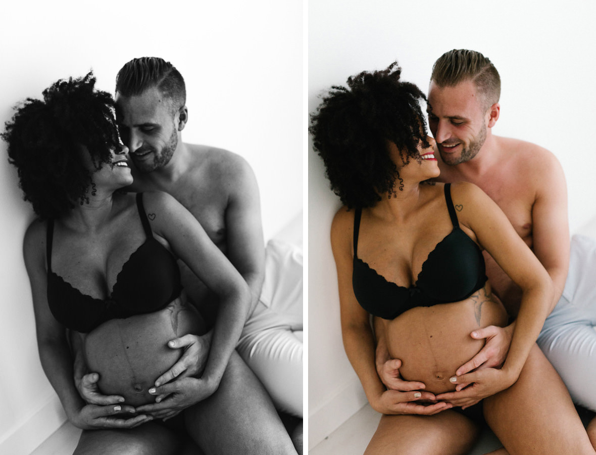 afro pregnancy shoot in black underwear with partner Maternity pregnancy bump image natural white studio eversley hampshire. berkshire and surrey yasmin anne photography